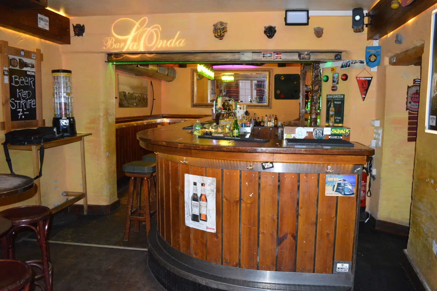 The round wooden counter of Bar LaOnda, with the Bar LaOnda lettering on the wall above